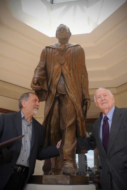 Dr. Doug Smith and Alex at the unveiling of the statue on the FMU campus