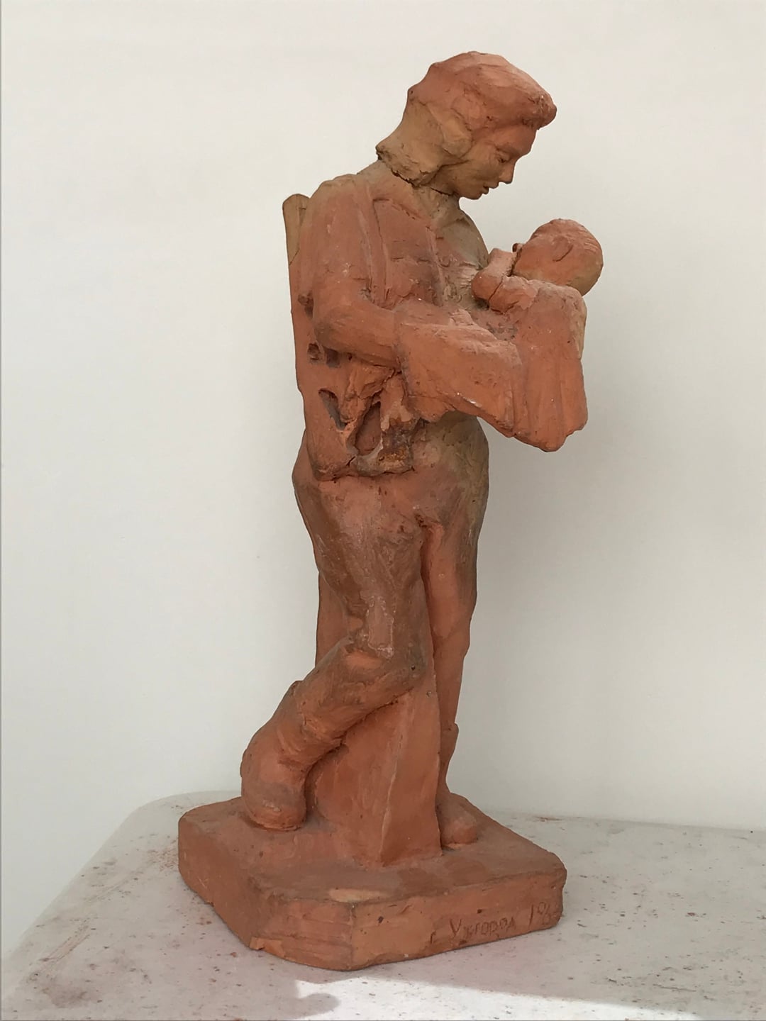 Woman with baby - very early piece