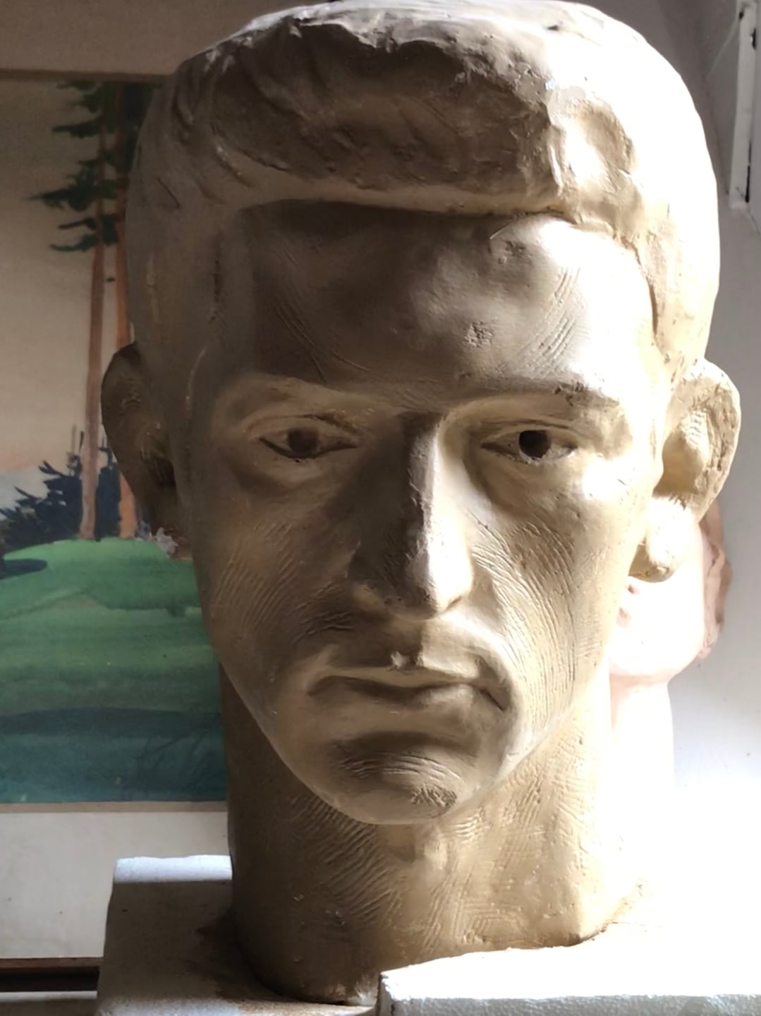Early sculpture of a young man