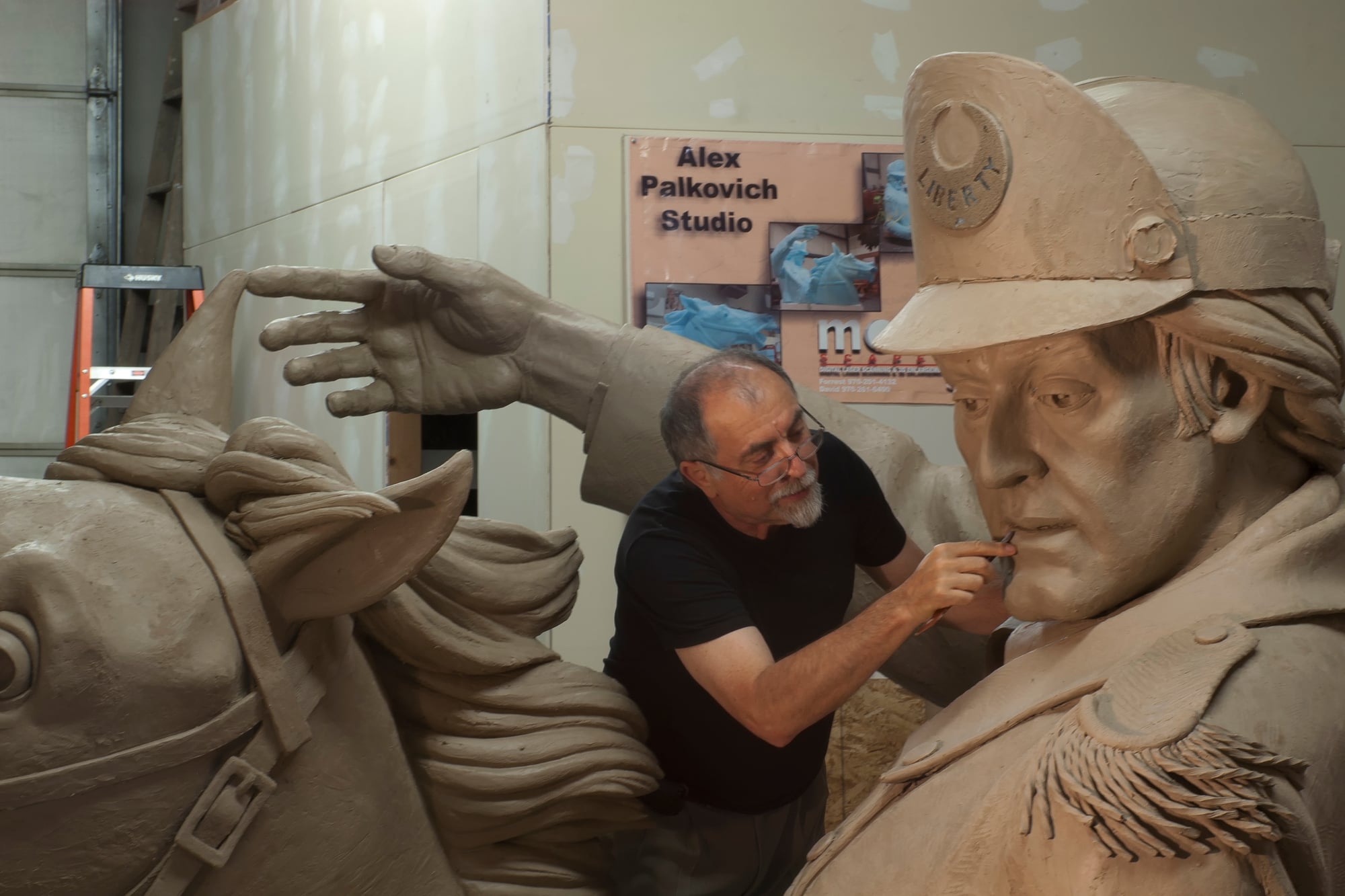 Some sculptures are so large in their final form that the sculptor is dwarfed by the overall dimensions.
