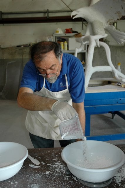 Alex carefully weighing the plaster